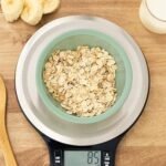 Basics Digital Kitchen Scale with LCD Display, Batteries Included, Weighs up to 11 pounds, Black and Stainless Steel